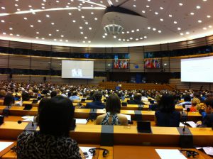 Neelie Kroes opens the Digital Assembly Plenary wearing the fibre bracelet